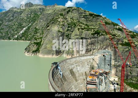 Baustelle für den Ersatz-Spitallamm-Staudamm am Grimselsee-Reservoir, Guttannen, Kanton Bern, Schweiz Stockfoto