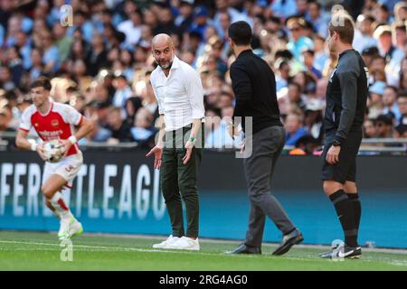 LONDON, Vereinigtes Königreich – 6. August 2023: Manchester City Manager Pep Guardiola reagiert während des FA Community Shield-Spiels zwischen Arsenal und Manchester City bei der W Stockfoto