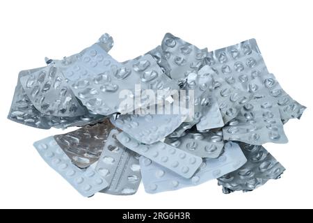 Ein Stapel gebrauchter leerer medizinischer Pillen-Blisterpackungen - weißer Hintergrund Stockfoto