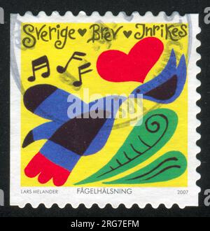 RUSSLAND KALININGRAD, 14. SEPTEMBER 2013: Briefmarke gedruckt von Schweden, zeigt Birds, Heart, Musical Notes, circa 2007 Stockfoto