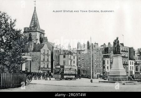 Albert Statue und Town Church, Guernsey, Kanalinseln. Entworfen von Joseph Durham (1814-1877) und 1863 enthüllt, überblickt diese Bronzestatue auf einem Granitsockel den Hafen von St. Peter Port. Stockfoto