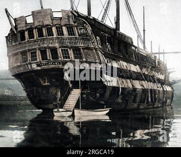 HMS 'unerbittlich', früher 'Duguay-Trouin', 1920. Dieses Schiff wurde 1789 in Frankreich gebaut, diente in Trafalgar und wurde kurz darauf von der Royal Navy gefangen genommen. Nach vierzig Jahren aktiven Dienstes wurde sie zum Trainingschiff für Jungen in Devonport. 1920 gehörte sie Mr. G. Wheatly Cobb, der sie als Ausbildungsschiff für die Pfadfinder nutzen wollte, aber die Reparaturkosten für dieses alte Schiff stiegen an. Stockfoto