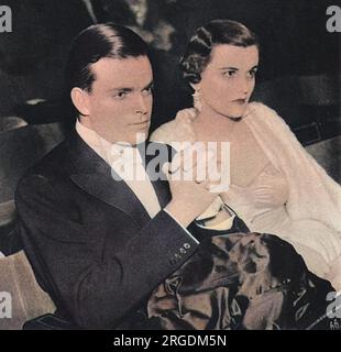 Die ehemalige Miss Margaret Whigham (1912-1993), später die Herzogin von Argyll, fotografierte mit ihrem Ehemann Charles Sweeny bei der ersten Nacht der Nüsse im Mai im Ambassadors Theatre in London im Februar 1938. Stockfoto