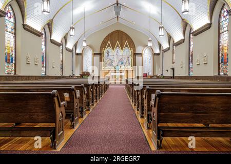 Charlotte North Carolina, St. Peters katholische Kirche, Bänke Sitzplätze am Altar, innen drinnen Stockfoto