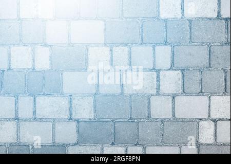 Oberfläche von mehrfarbigen Pflasterplatten. Schönes Muster, Nahaufnahme des Hintergrunds Stockfoto