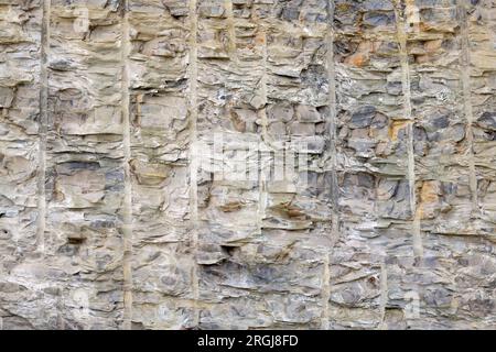 Steinhintergrund, sehr detaillierte Struktur der Granitoberfläche Stockfoto