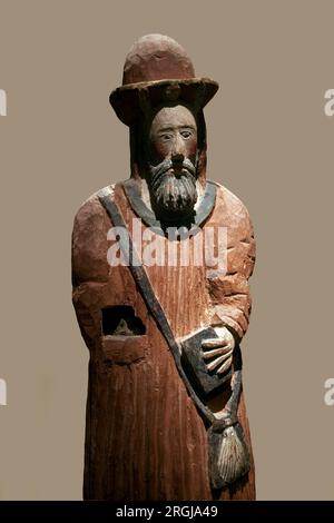 Saint Jacques de Zebedee, ou le Majeur. le saint est represente en pelerin de saint Jacques de Compostelle, portant une coquille sur son Sac. Statuette de bois Skulptee et polychrome, 17e Siecle. Musée breton de Quimper. Stockfoto