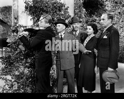 Gene Raymond, Charles Halton, Olympe Bradna, am Set des Films, "Stolen Heaven", Paramount Pictures, 1938 Stockfoto