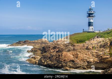 Das Leuchtturm auf der isla Pancha in Galicien, atlantikküste Spaniens Stockfoto