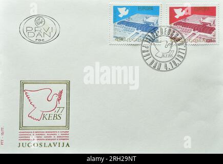 First Day Cover letter with cancelled postage stamps printed by Yugoslavia,  that show Congress Building,   Interparliamentary Conference. Stock Photo