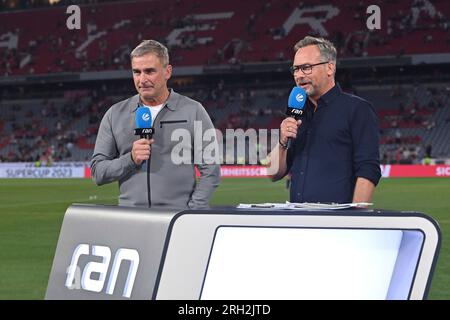 LIEF Sa 1 Moderator Matthias OPDENHOEVEL und Fußballexperte Stefan KUNTZ.Sat1. Fußball DFL Supercup 2023/FC Bayern München - RB Leipzig 0-3 am 12. August 2023 in München ALLIANZAREN A. ? Stockfoto