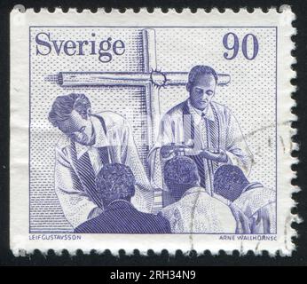 SCHWEDEN - CIRCA 1978: Von Schweden gedruckter Stempel zeigt Evangelical National Missionary Society, circa 1978 Stockfoto