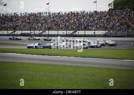 Indianapolis, USA. 13. Aug. 2023. INDIANAPOLIS, INDIANA - AUGUST 13: Daniel Suarez (Nr. 99 Trackhouse Racing Freeway.com Chevrolet) führt am 13. August 2023 in Indianapolis, Indiana, während der Verizon 200 auf dem Brickyard auf dem Indianapolis Motor Speedway an. ( Kredit: Jeremy Hogan/Alamy Live News Stockfoto