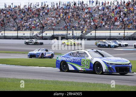 Indianapolis, USA. 13. Aug. 2023. INDIANAPOLIS, INDIANA - 13. AUGUST: Daniel Suarez (#99 Trackhouse Racing Freeway.com Chevrolet) während der Verizon 200 im Brickyard auf dem Indianapolis Motor Speedway am 13. August 2023 in Indianapolis, Indiana. ( Kredit: Jeremy Hogan/Alamy Live News Stockfoto