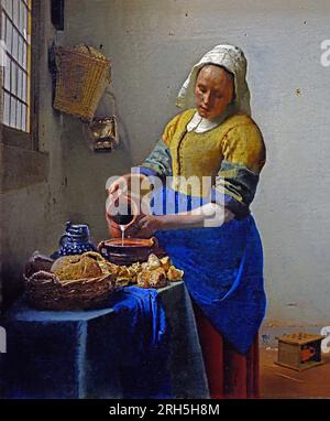 The Kitchen Maid Milkmaid - Het melk meisje (1658-1660) Johannes Jan Vermeer Dutch, Delft 1632–1675 Delft Niederlande ( niederländischer Maler im Goldenen Zeitalter, einer der größten Maler, 17. Jahrhundert. Bevorzugte zeitlose, gedämpfte Momente, bleibt rätselhaft, unnachahmliches Farbschema und verwirrender Lichtinhalt) Stockfoto