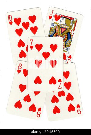 Pokerhand mit Spielkarten, die einen Herzschlag von einer Sieben zu einem Bube zeigen. Stockfoto