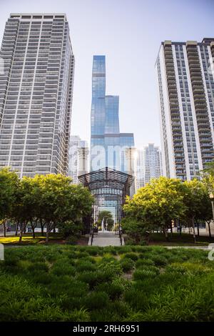 The Richard and Annette Bloch Cancer Survivors' Garden with the The St. Regis Chicago building (Vista Tower) in the back, Chicago, Illinois, USA Stock Photo