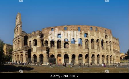 Panorama of the Colosseum in Rome, Italy in the summer afternoon. People visit the Colosseum in central Rome Stock Photo