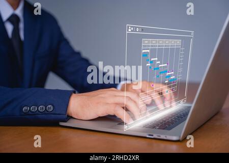 Analysten, die mit Computer in Geschäftsanalysen und Datenmanagementsystemen arbeiten, um Berichte mit KPI und Metriken zu erstellen, die mit der Datenbank verbunden sind. Unternehmensleitung Stockfoto