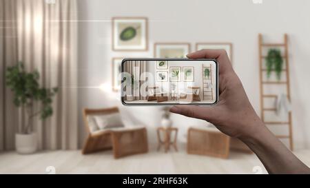 Hand halten Smartphone, AR-Anwendung, simulieren Möbel und Interior Design-Produkte im realen Haus, Architekt Designer-Konzept, verwischen Hintergrund, s Stockfoto