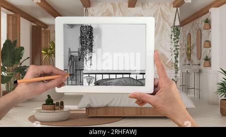 Hände halten und zeichnen auf dem Tablet zeigt böhmische Schlafzimmer in Boho Stil Details CAD-Skizze. Echte fertige Innenausstattung im Hintergrund, Architektur Stockfoto