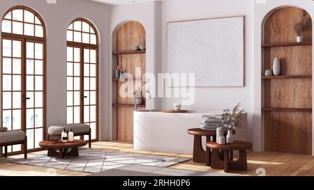 Modernes Holzbad mit Parkett und Bogenfenstern. Freistehende Badewanne, Teppiche und Sessel in weiß- und Beigetönen. Innenausstattung im Boho-Stil Stockfoto