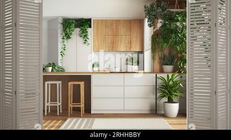 Weiße Falttüröffnung auf minimaler Holzküche mit Insel und Geräten und mit vielen Topfpflanzen, Architekt Designerkonzept, Urbanwald Stockfoto