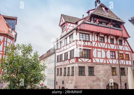 Bavarian traditional houses called fachwerkhaus. Albrecht Durer House in Nuremberg. Medieval architecture. Nurnberg landmark. Half-timbered house. Stock Photo