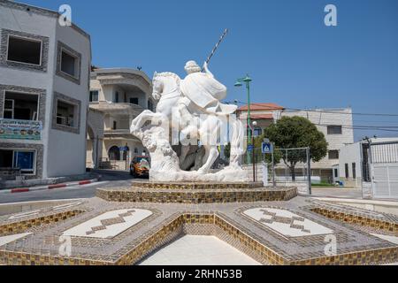 Die Statue des Propheten Elija, der einen Drachen Ghajar tötet (arabisch غجر, auch Rhadjar), ist ein alawitisch-arabisches Dorf am Fluss Hasbani, an der Grenze zwischen dem Fluss Stockfoto