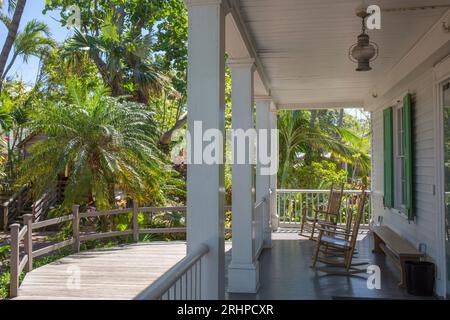 Key West, Florida, USA. Veranda of the Audubon House Museum set amidst lush tropical gardens, Old Town. Stock Photo