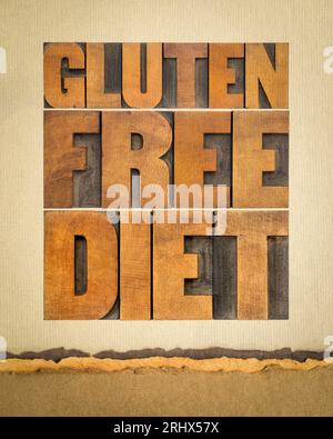 Glutenfreie Diät-Wortstexte - Text in Buchdruckholz gegen Kunstpapier, gesundes Esskonzept Stockfoto