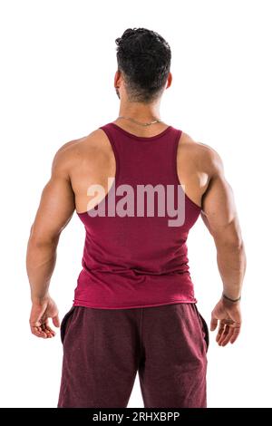 Foto eines Mannes mit rotem Tanktop und kastanienbraunen Shorts Stockfoto