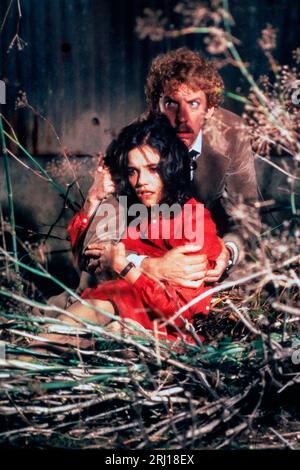 DONALD SUTHERLAND und BROOKE ADAMS in INVASION OF THE BODY SNATCHERS (1978) unter der Regie von PHILIP KAUFMAN. Credit: UNITED ARTISTS / Album Stockfoto