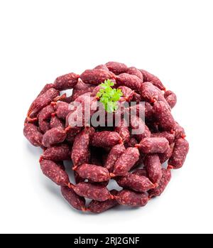 Mini Salami Würstchen isoliert auf weiß Stockfoto