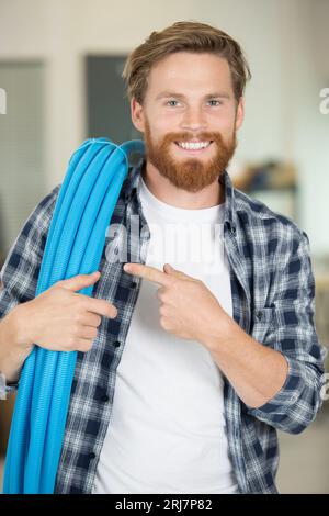 Porträt eines glücklichen Klempners Stockfoto