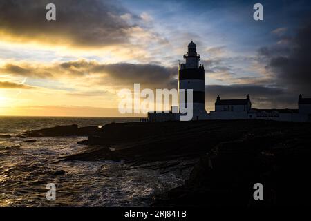 Sonnenuntergang am Hook Lighthouse, Co. Wexford, Irland Stockfoto