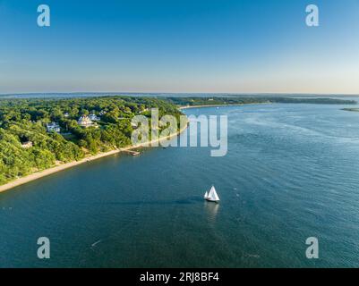 aerial view of homes on Shelter Heights water front homes and a sailboat. Stock Photo