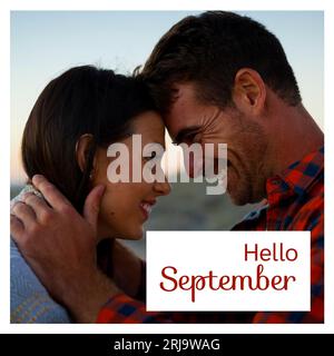 Komposition aus Hello september Text über kaukasisches Paar am Strand Stockfoto