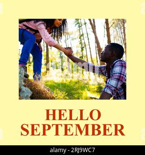 Komposition aus Hello september-Text über Biracial Ehepaar im Wald Stockfoto