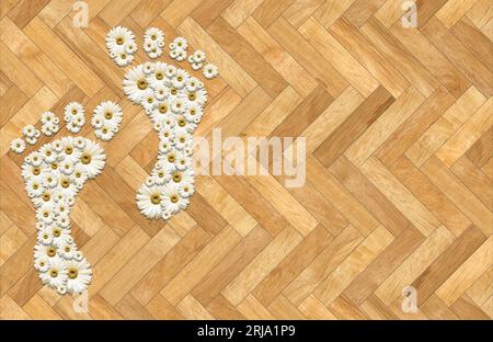 Gänseblümchenblumen in Fußabdrücken (menschliche Füße) angeordnet, auf einem perfekten Fischgrätenparkett mit Kopierraum. Stockfoto