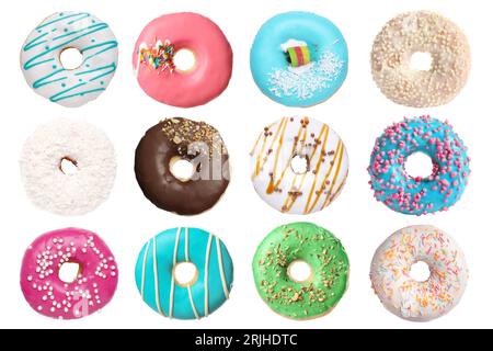 Set mit leckeren Donuts isoliert auf weiß Stockfoto