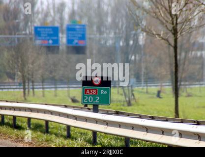 Distance sign of the shortest motorway in the netherlands : A38 between Rotterdam and Ridderkerk Stock Photo