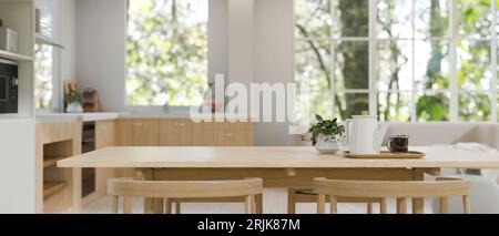 Close-up image of a copy space on a minimal wooden dining table in a minimal Scandinavian kitchen in white and woody interior style. 3d render, 3d ill Stock Photo