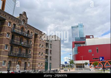 Red facade of the new Luxor Theater in Rotterdam as seen from the parking garage on Otto Reuchlinstraat. Stock Photo