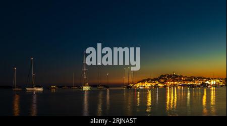 sailing  boat in bay near Primosten at night Stockfoto