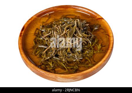 Black thyme with olive oil at wooden bowl. Zahter isolated on white background. Mediterranean food. vegan food. Close up Stock Photo