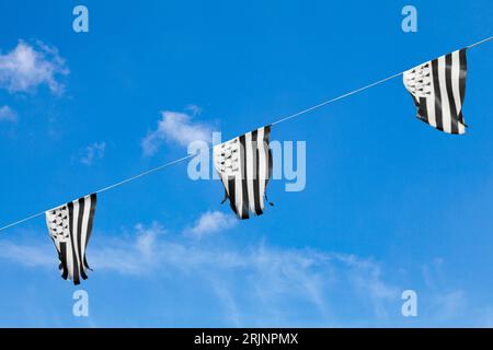 Breton flag bunting (Gwenn ha du) in Guerlesquin, Brittany. Stock Photo