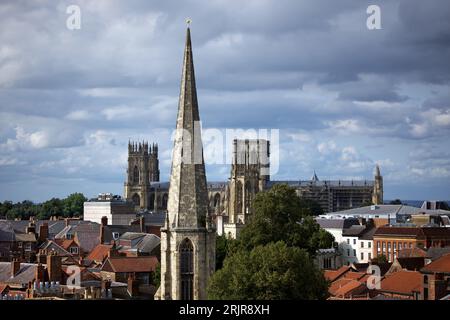 This skyline image of York in the UK shows the spire of St Mary's Church in the foreground and York Minster in the background. Stockfoto