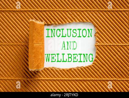 Inclusion and wellbeing symbol. Concept words Inclusion and wellbeing on beautiful white paper. Beautiful brown background. Motivational inclusion and Stock Photo