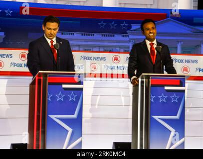 Milwaukee, United States. 23rd Aug, 2023. Republican presidential candidate Ron DeSantis (L) and Republican presidential candidate Vivek Ranaswamy (R) stand at their positions during the first Republican presidential candidate debate of the 2024 presidential race at Fiserv Forum in Milwaukee, Wisconsin, August 23, 2023. Fiserv Forum will will be the site of the Republican National Convention July 15-18, 2024 where the Republican presidential candidate will be nominated. Photo by Tannen Maury/UPI Credit: UPI/Alamy Live News Stock Photo